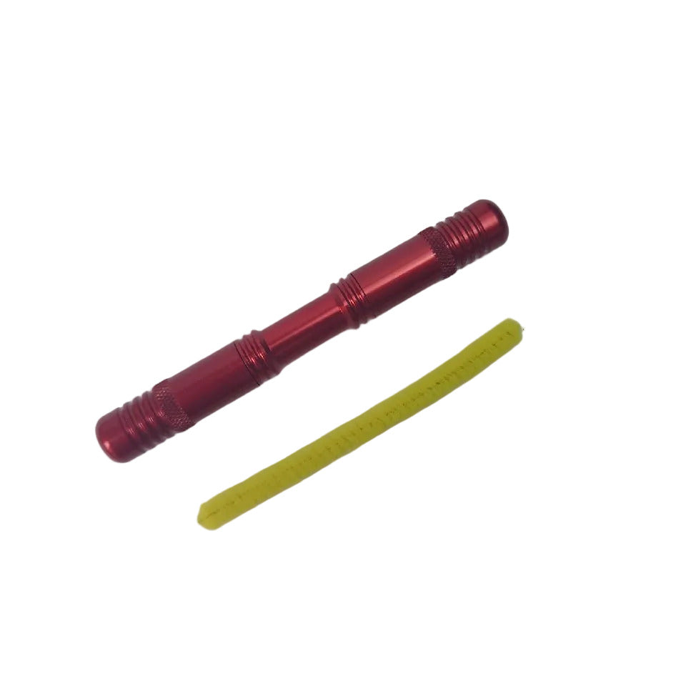 Red Dynaplug Racer Pro bicycle tubeless tyre repair tool with yellow cleaner