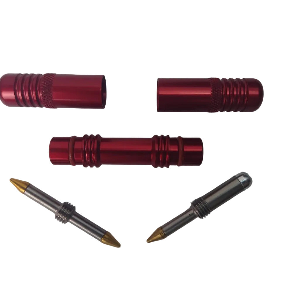 Red Dynaplug Racer Pro bicycle tubeless tyre repair tool showing inner plugs, insertion tubes and end caps